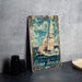 a picture of a sailboat on a table