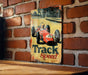 a picture of a race car on a brick wall