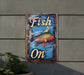 a sign that says fish on on the side of a building