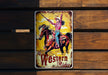 a western ride sign on a wooden wall