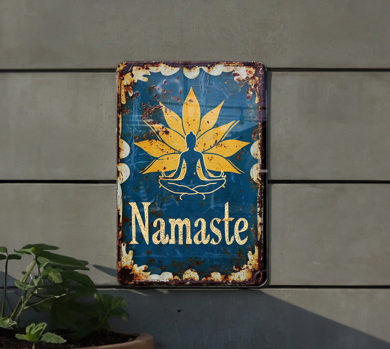 a sign on a wall that says namaste