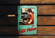 a sign on a wooden wall that says edit video