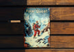 a polar quest book sitting on top of a wooden bench