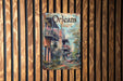a book is hanging on a wooden wall