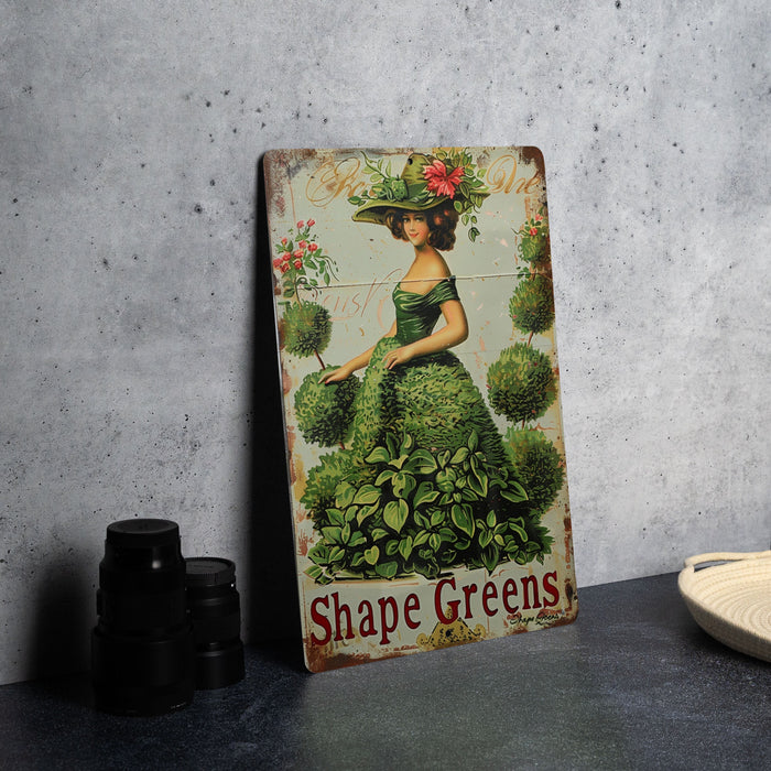 a picture of a woman in a green dress