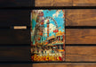 a wooden bench with a painting of a ferris wheel