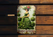a picture of a woman in a green dress