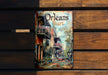 a book sitting on top of a wooden bench