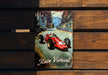 a picture of a race car on a wooden bench
