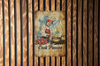 a painting of a cook is hanging on a wall