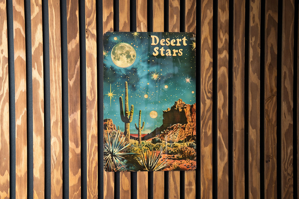 a desert stars book hanging on a wooden wall