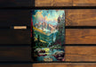 a painting of a mountain scene on a wooden bench