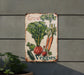 a sign that says grow veggies on the side of a building