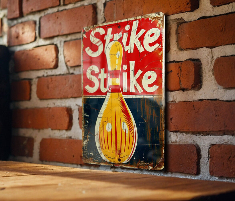 a sign on a brick wall that says strike strike