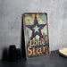 a lone star sign sitting on top of a table