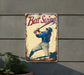 a metal sign with a baseball player holding a bat