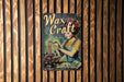 a picture of a book on a wooden wall