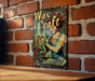 a sign on a brick wall that says wax'craft