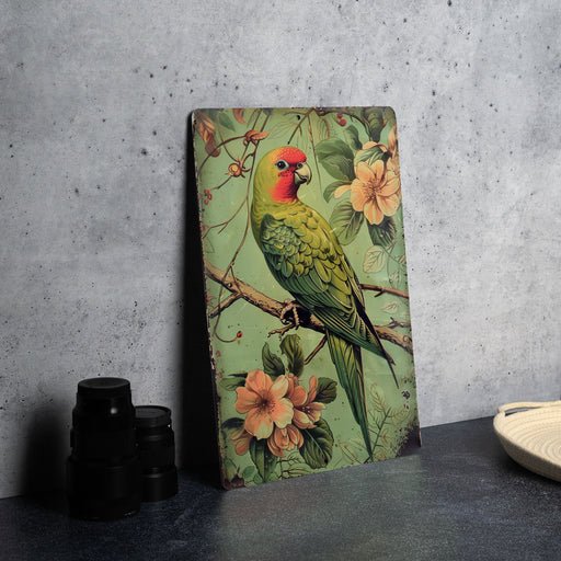 a painting of a parrot sitting on a tree branch