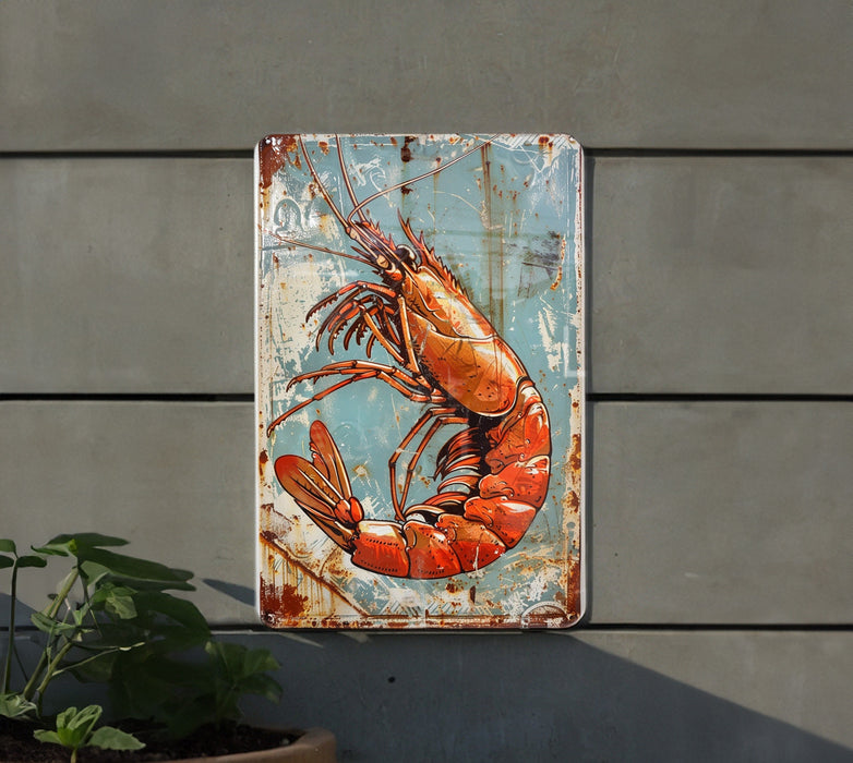 a rusted metal sign with a lobster painted on it