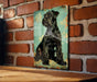 a picture of a dog on a brick wall