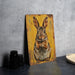 a painting of a rabbit on a yellow background