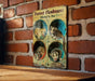 a sign on a brick wall that says ferret funhouse