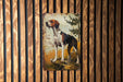 a painting of a dog on a wooden wall