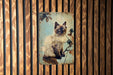 a picture of a cat on a wooden wall