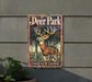 a deer park sign mounted to the side of a building