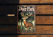 a deer park sign on a wooden wall