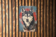 a painting of a dog on a wooden wall