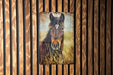 a picture of a horse on a wooden wall