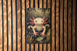 a picture of a frog on a wooden wall