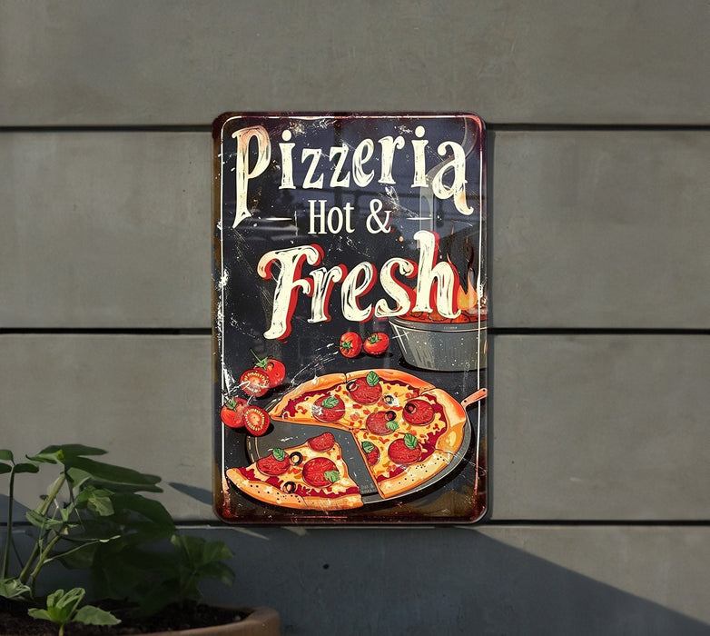 a sign advertising a pizza restaurant on the side of a building