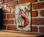 a picture of a lobster on a brick wall