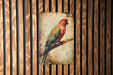 a colorful bird perched on top of a wooden wall