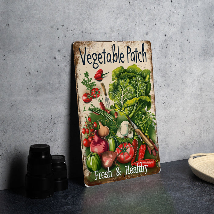 a vegetable patch sign sitting on top of a table