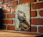 a picture of a lizard on a brick wall