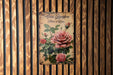 a sign on a wooden wall that says rose garden