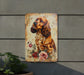 a painting of a dog on a wall next to a potted plant