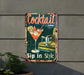 a metal sign that says cocktail sip in style