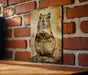 a picture of a rodent on a brick wall
