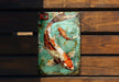 a picture of a koi fish on a wooden bench