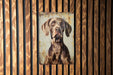 a painting of a dog on a wooden wall