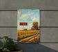 a painting of a farm scene on a wall
