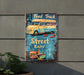 a sign on the side of a building advertising street eats