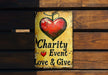a sign that says charity event love and give