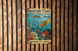 a sign on a wooden wall that says aquarium visit