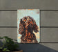 a painting of a dog on a wall